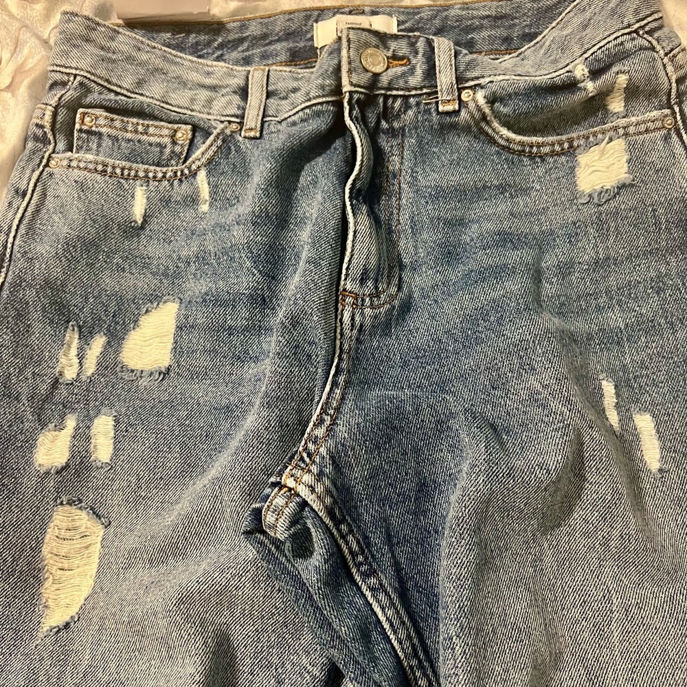 Distressed Blue Jeans
